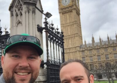 Danan Coleman and a friend with Big Ben in the background - Photograph by Adventure With Danan