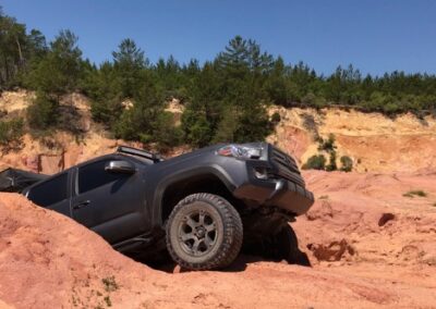 Overland Bound member attempting a hill climb
