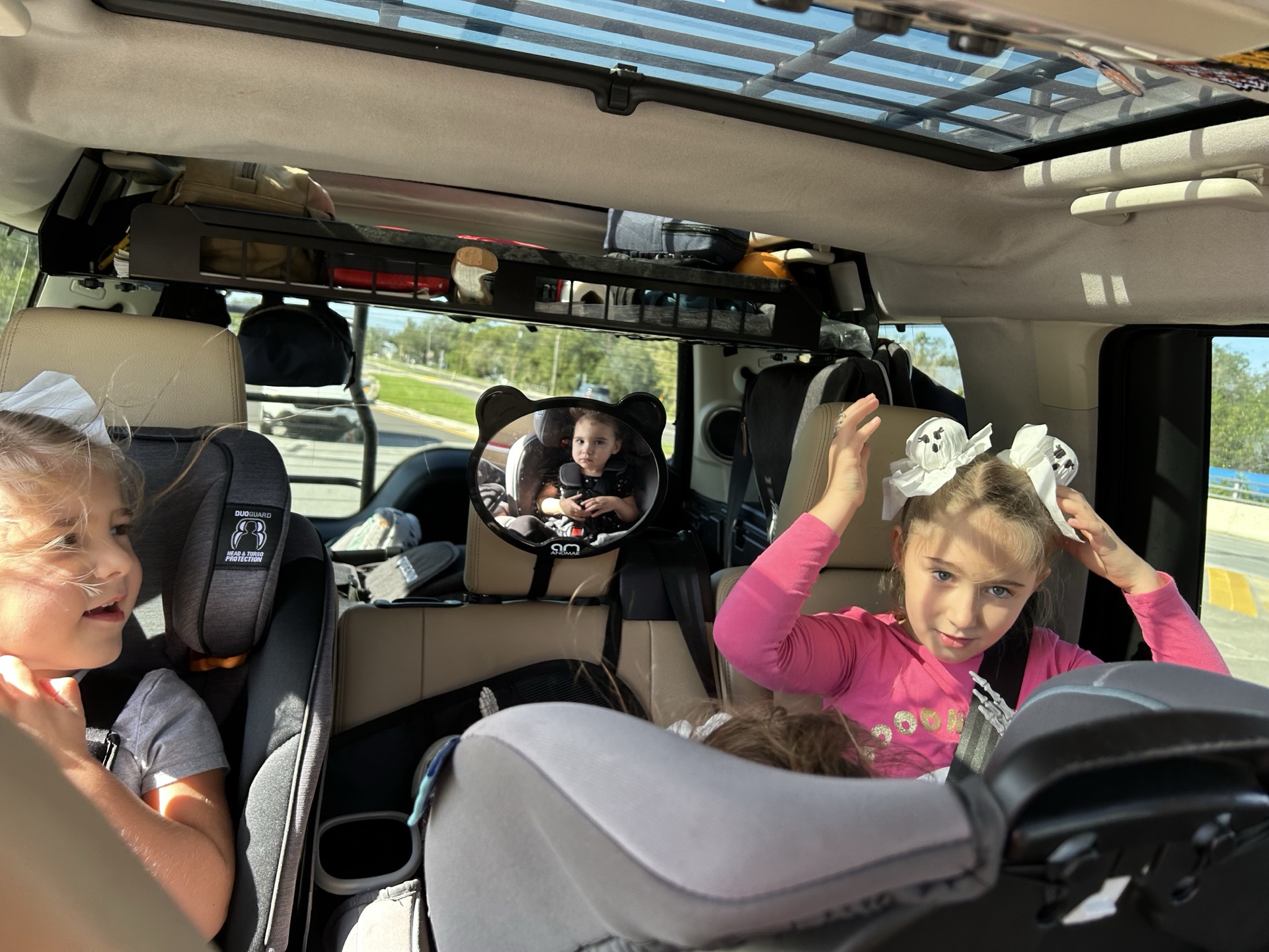 Coming Home to the Storm 1 The kids buckled in for the drive north