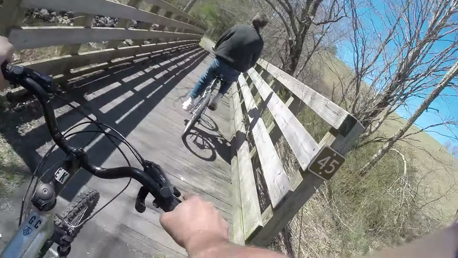 Biking the Virginia Creeper Trail, Whitetop to Damascus 7 A rider crossing a wooden trestle ahead on the Virginia Creeper Trail