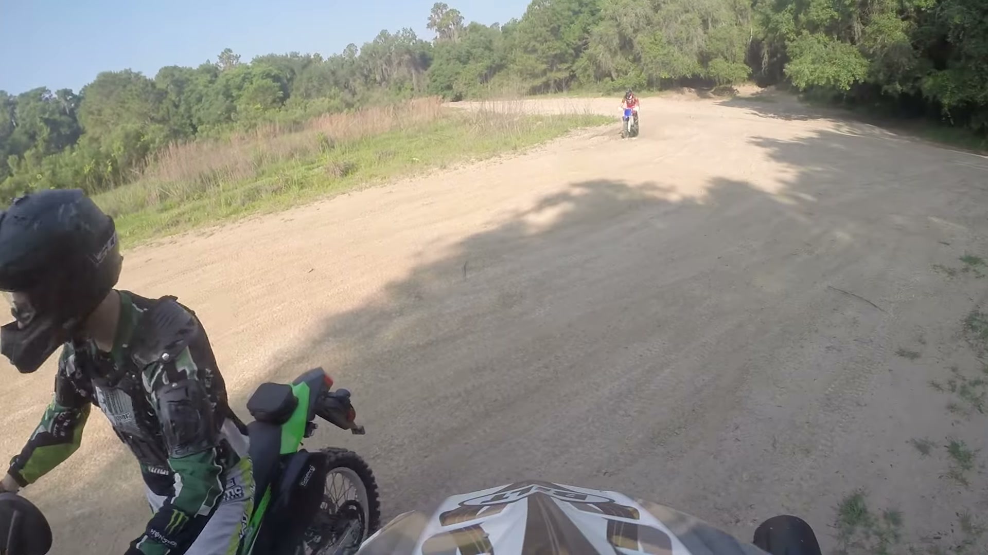 Dirt Biking the Croom Motorcycle Area 14 A rider on a green Kawasaki in the sand pit at Croom
