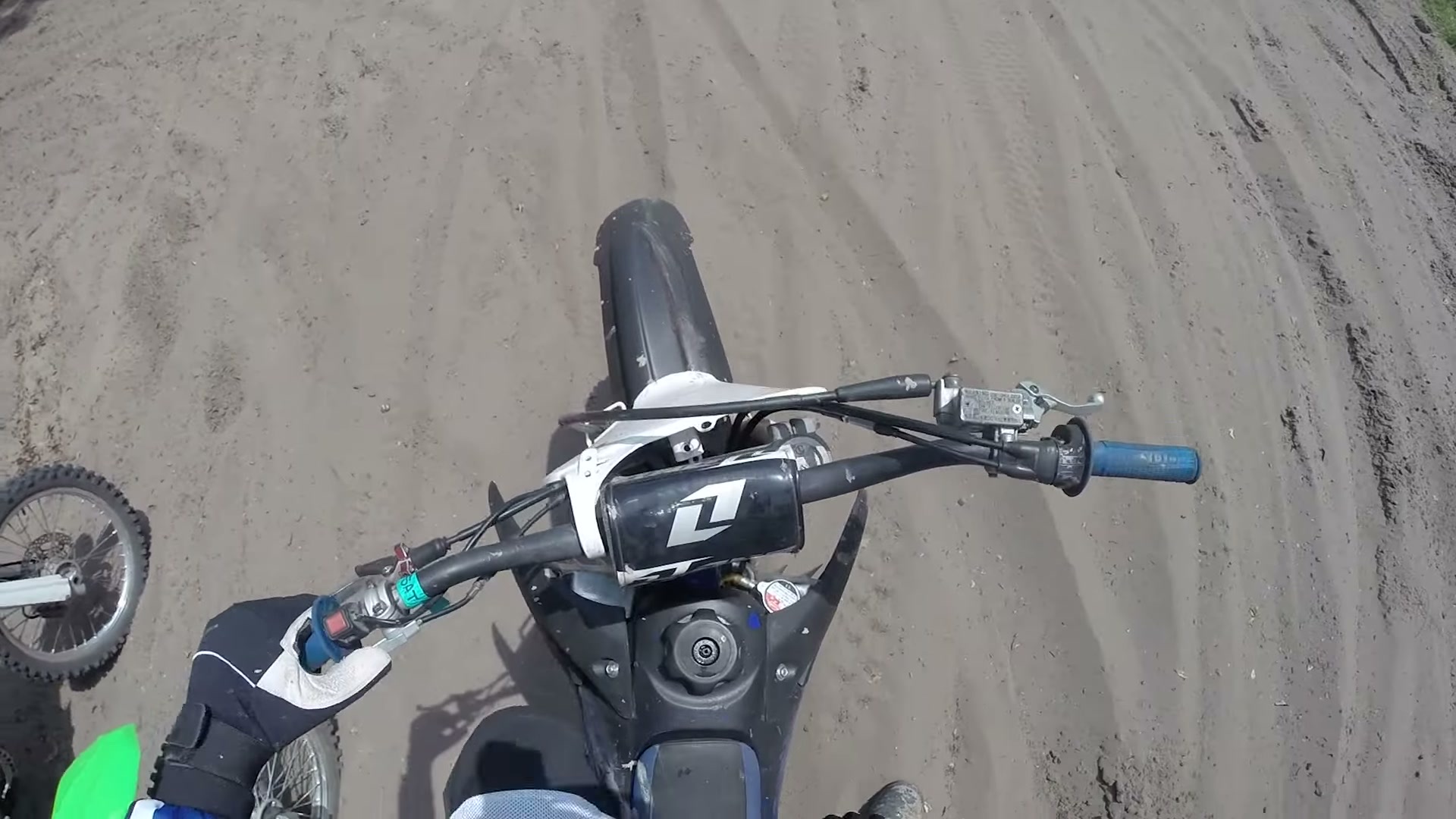 Dirt Biking the Croom Motorcycle Area 17 Handlebar view of a dirt bike in deep sand at Croom