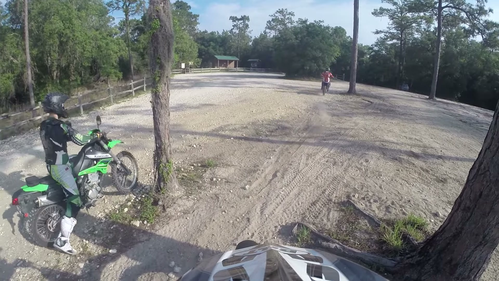 Dirt Biking the Croom Motorcycle Area 8 A rider on a green Kawasaki in the Croom staging lot