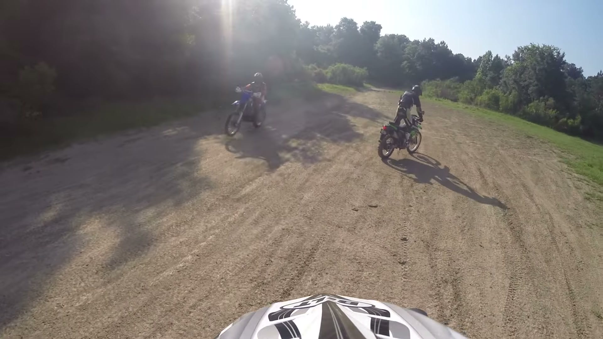 Dirt Biking the Croom Motorcycle Area 4 Two dirt bikes riding the sandy floor of an old mine pit at the Croom Motorcycle Area