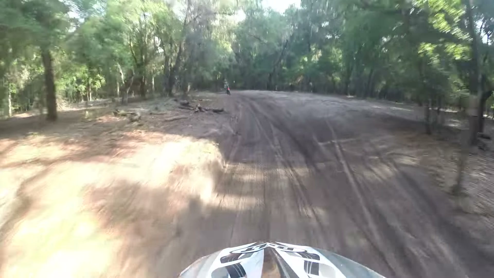 Dirt Biking the Croom Motorcycle Area 10 A wide sand trail through the shade trees at Croom