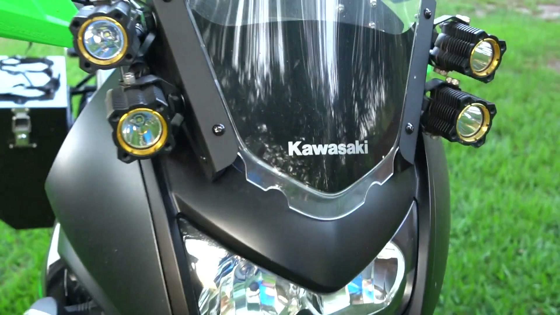 My Kawasaki KLR 650 Adventure Bike Build for the Trans America Trail 12 The front of the KLR 650 with four KC lights and the windshield
