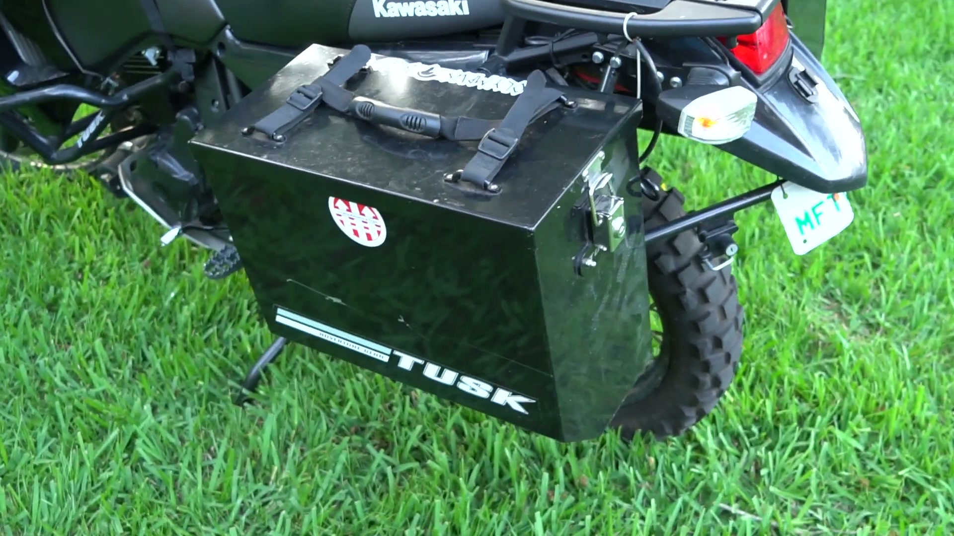 My Kawasaki KLR 650 Adventure Bike Build for the Trans America Trail 11 A black Tusk hard pannier mounted on the side of the KLR 650