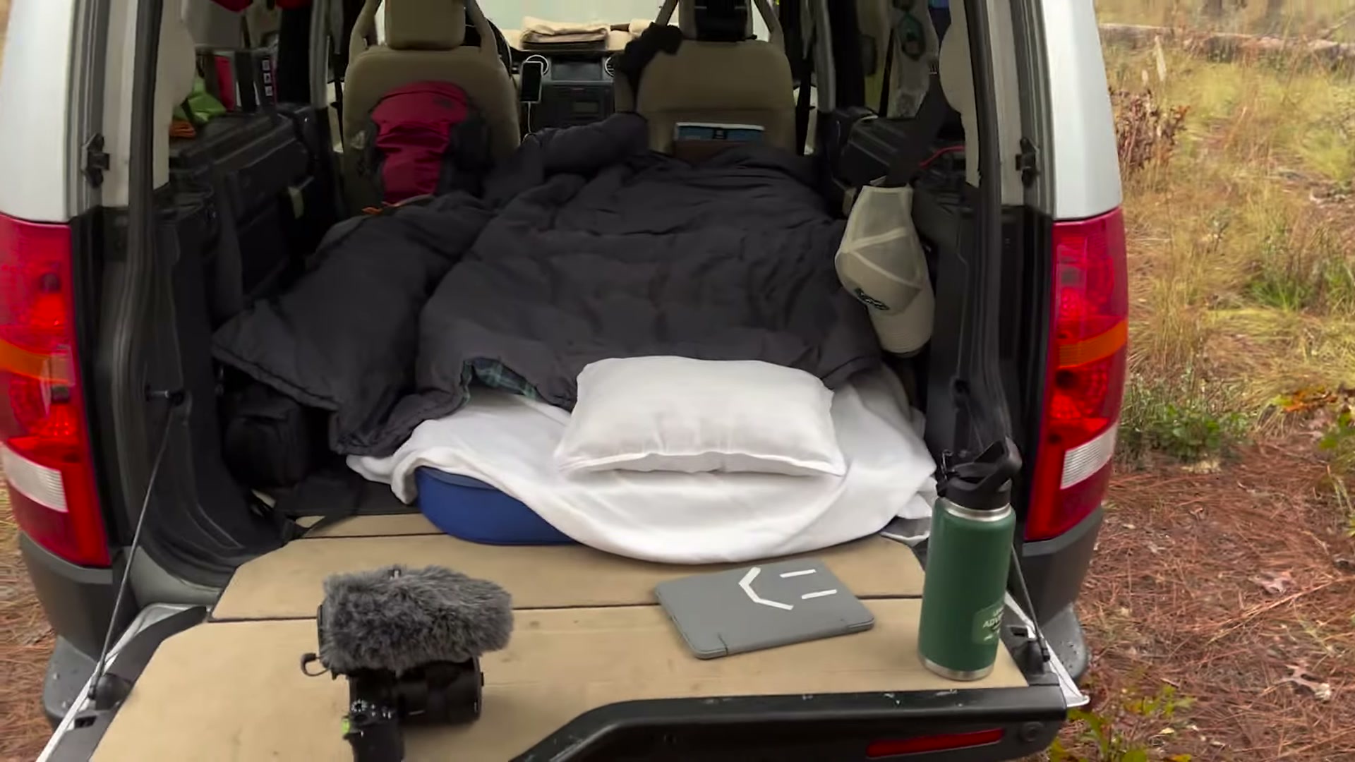 One Night in Ocala National Forest: Camp Cooking, Car Camping and Lake Dorr 4 The sleeping pad, blanket and pillow laid out in the back of a Land Rover LR3