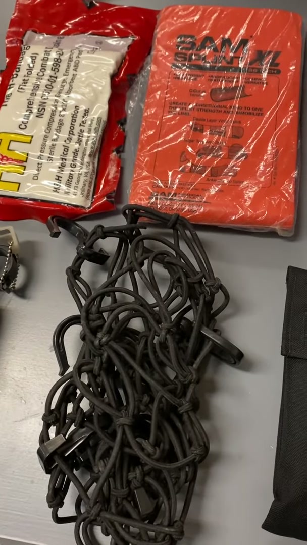 Packing a Motorcycle for a 30-Day Adventure Ride 3 A SAM splint, trauma dressing and cargo net from the motorcycle first aid and recovery kit